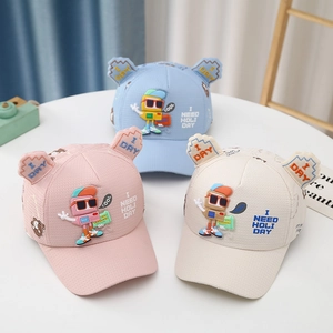 Detailed view of pink, blue, and beige baby baseball caps with 3D cartoon robot graphics