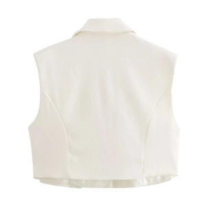 Rear view of white sleeveless vest top with a classic collar and textured fabric finish