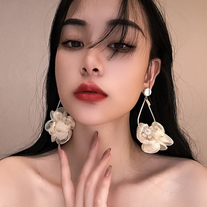 Elegant oversized white fabric flower drop earrings with golden rings and pearl centers