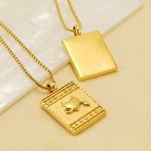 Polished gold stainless steel square pendant necklace featuring embossed devil heart motif