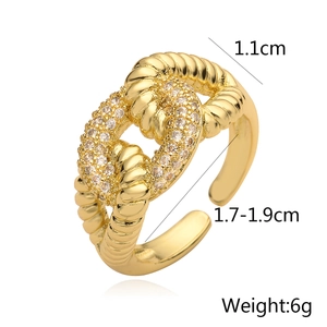 Detailed view showing dimensions of a gold-plated twisted ring with pavé zircons