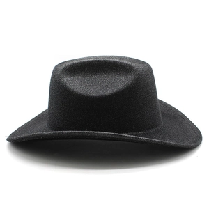 Close-up of black matte cowboy hat showing wool felt texture and wide brim details