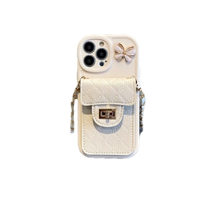 Cream white crossbody phone case with quilted leather wallet and butterfly charm detail