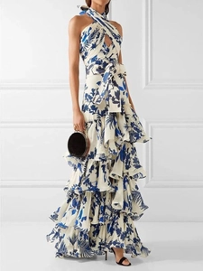 Bohemian floral halter neck tiered maxi dress with waist tie and layered print