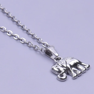 Polished silver elephant pendant necklace with high-gloss finish on a refined O-chain