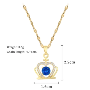 Detail of gold crown heart necklace with blue gemstone and dimensions: 2.2cm x 1.6cm