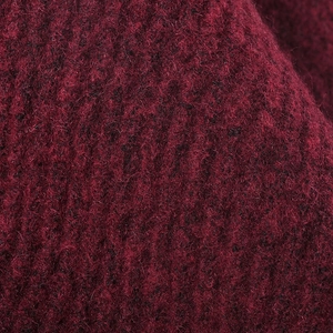 Thick burgundy ribbed wool knit hat with soft fleece texture for winter outdoor warmth