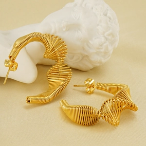 Golden spiral wire-wrapped stainless steel hoop earrings with unique hollow design