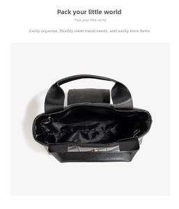 Top view of black quilted tote bag showing interior compartment and woven handles