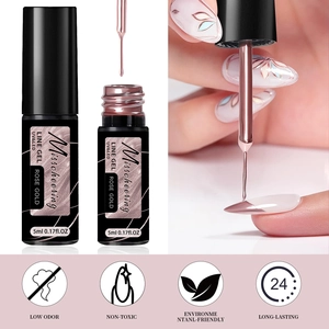 Detail of rose gold nail line gel with brush applicator and professional manicure effects
