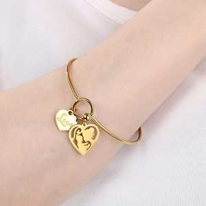 Adjustable gold heart MOM bracelet with Love pendant and mother-child cutout silhouette