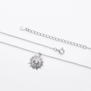 Macro shot of S925 sterling silver evil eye pendant and adjustable spring clasp detail