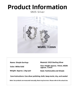 Macro detail of S925 silver cross earrings with dimensions 14mm by 7.3mm and weight 2.8g