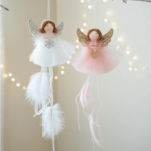 Christmas angel dolls with tulle skirts and feather wings for festive tree decoration