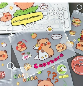 Detail of translucent Capybara stationery pouches with zipper and cute cartoon patterns