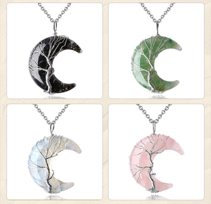 Detail of four colorful Tree of Life moon pendants with stainless steel chains
