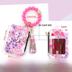 Pink floral card wallet with silicone beaded bracelet and tassel charms, size specifications