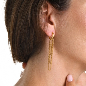 Close-up of triple-layered bead chain drop earrings in 18K gold-plated stainless steel
