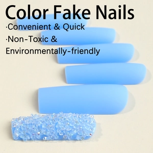Extra-long light blue press-on nails with matte finish and sparkling rhinestones
