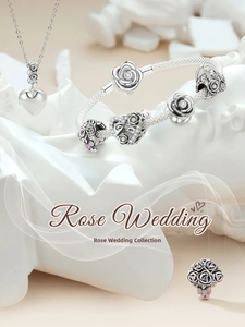 Detailed view of S925 silver rose wedding charm bracelet and heart pendant necklace