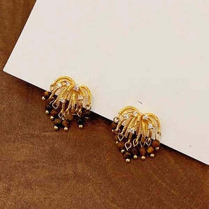 Vintage gold tassel earrings with brown beads and crystals on display card