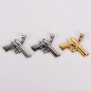 Three-piece pistol-shaped stainless steel pendant necklaces in gold and silver finishes