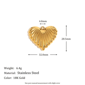 Detail view of 18K gold plated heart pendant with sunburst texture and sizing specs