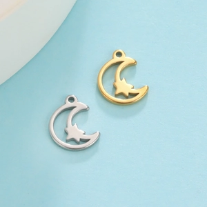 Golden and silver moon and star charms for DIY jewelry making on light blue background
