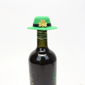 Mini green felt St. Patrick's Day wine bottle hat with gold glitter shamrock decoration