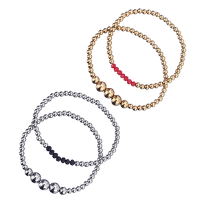 Detail view of handmade elastic bracelets with stainless steel beads and faceted crystals