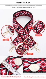 Close-up of bohemian pattern woven strap with golden metal hook and adjuster