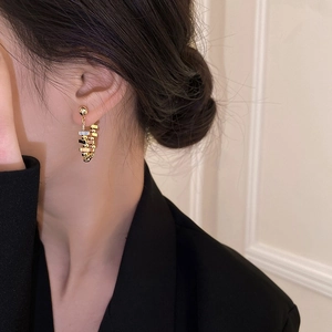 U-shaped earrings with silver needles and crushed silver geometric dangling gold cubes