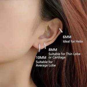 Minimalist silver hoop earrings with pavé crystals in 6mm, 8mm, and 10mm sizes