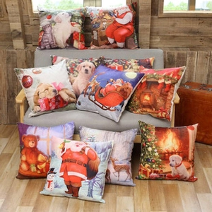 Detail of tufted Christmas cushion covers with embroidered Santa, dog, and bear patterns