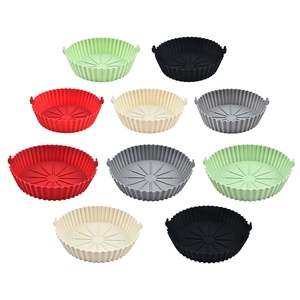 Reusable non-stick silicone air fryer liners set in various colors with oil drainage grooves