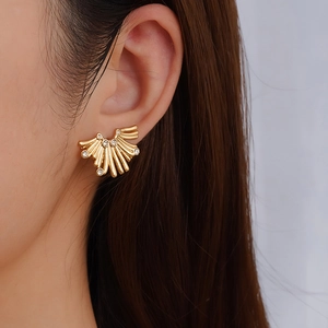 Chic 18K gold plated irregular fan-shaped earrings with pearls for women shown on ear