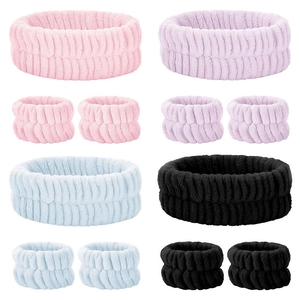 Set of coral fleece headbands and wristbands in pink, purple, blue and black