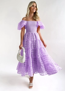 Detail of lavender off-shoulder puff sleeve dress with sheer plaid texture and tiered hem