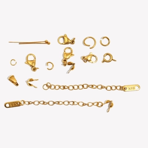 Detailed macro view of 18K gold plated lobster clasps and DIY jewelry findings set
