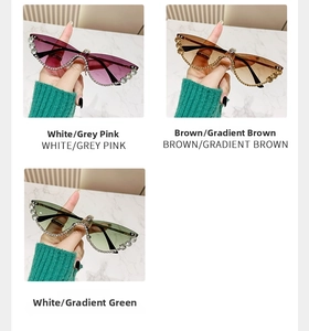 Detailed view of cat eye sunglasses with rhinestones in grey pink, brown and green