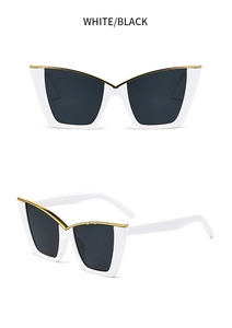 Detail view of white cat eye sunglasses with gold trim and black lenses from two angles