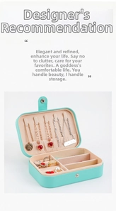 Detail view of mint green PU leather jewelry box with necklace hooks and ring slots