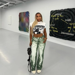 Street style sleeveless cropped tee and artistic green tie-dye pants for women