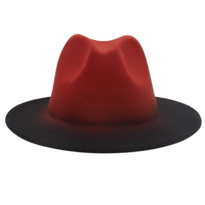 Detailed view of two-tone red and black gradient wool felt fedora with a pinched crown