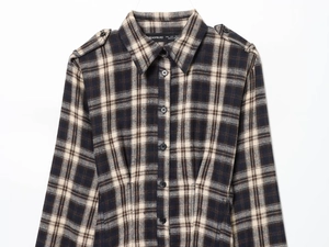 Detail of navy and beige plaid shirt featuring classic collar and button-down front