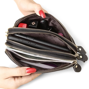 Brown leather clutch bag with three-layer zipper design and large storage capacity