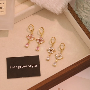 Elegant vintage gold floral drop earrings with pink and white crystal teardrops