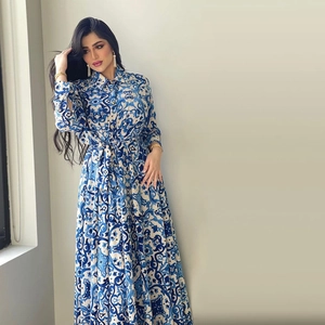 Blue and white porcelain print maxi shirt dress with long sleeves and waist belt