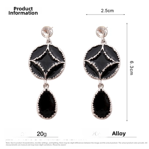 Detail view of black enamel drop earrings showing 6.3cm height and 2.5cm width dimensions