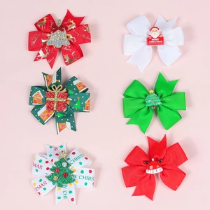 Set of six Christmas hair bows featuring Santa, reindeer, and holiday prints on ribbon